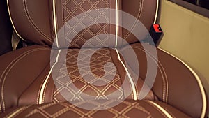 Luxury brown leather car seat tilt close up shot
