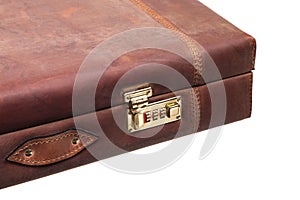 Luxury brown leather case with gold-plated combination locks for arms isolated on white