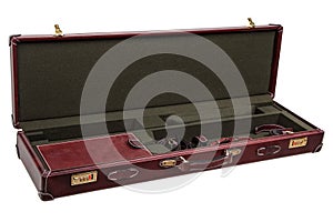 Luxury brown leather case with gold-plated combination locks for arms isolated on white