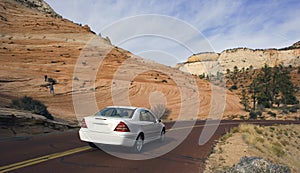 Luxury car driving in Utah.