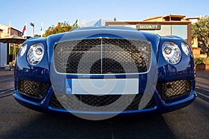 Luxury car on the pier of the Porto Cervo, close up