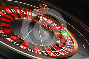 Luxury Casino roulette wheel on black background. Casino theme. Close-up black casino roulette with a ball on 21. Poker