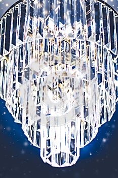 Luxury chandelier with crystal glass, interior design and home decor lighting detail