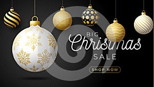 Luxury Christmas sale horizontal banner. Christmas card with ornate black, gold and white realistic balls hang on a thread on