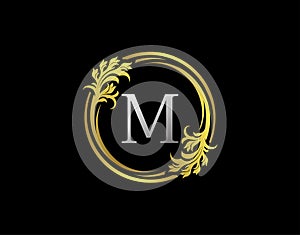 Luxury Circle M Letter Floral Logo. Royal Gold M Swirl Vector Icon