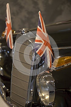Luxury classic car detail with union jack standard