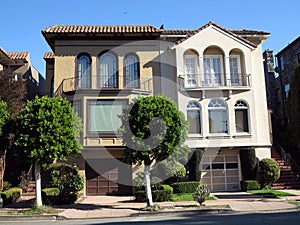 Luxury condo townhouse large arched windows and balconies