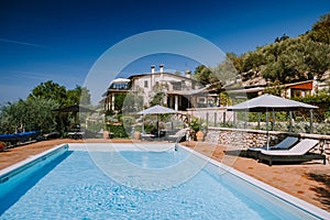 Luxury country house with swimming pool in Italy, Couple on Vacation at luxury villa in Italy, men and woman watching sunset