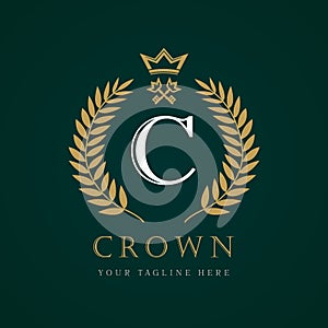 Luxury Crown calligraphic key letter `C` monogram logo
