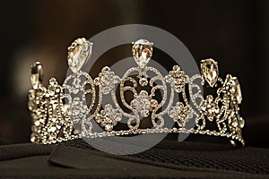 Luxury crown with diamonds, diadem jewelry, on black background