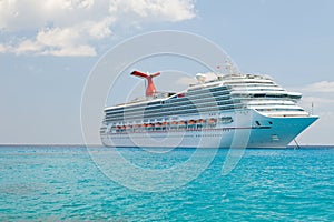 Luxury Cruise Ship Anchored in the Cayman Islands photo