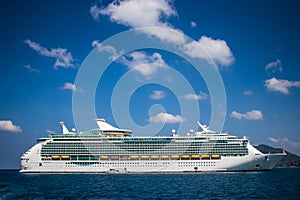 Luxury cruise ship sailing from port. Big cruise ship in the sea