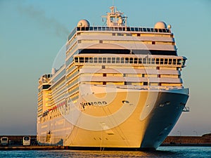 Luxury cruising ship ready to sail away. front angled view