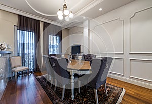 Luxury dining room interior with chairs and table