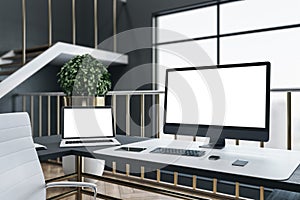 Luxury director`s workspace with laptop and computer on table