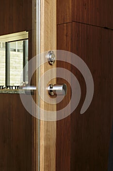 Luxury door with chrome door knob and glass window