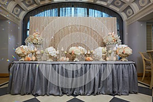 Luxury, elegant wedding reception table arrangement, floral centerpiece