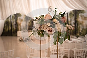 Luxury, elegant wedding reception table arrangement, floral centerpiece