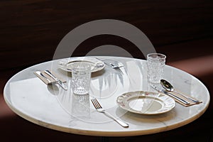 luxury emtry glass on the marble dinner table