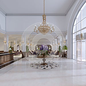 Luxury entrance in classic hotel with a large bouquet of flowers and a large golden chandelier