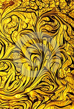 Luxury expensive golden glitter and acrylic inks marble background.