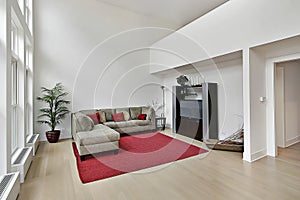 Luxury family room with two story windows