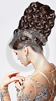 Luxury. Fashion Model with Trendy Updo - Braided T