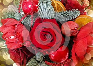 Christmas bouquet with red roses and ornaments close-up stock photo images