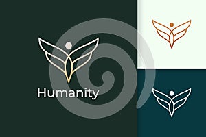 Luxury freedom logo in human and wing represent humanity or peace