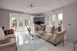 Luxury furnished lounge with white porcelain flooring