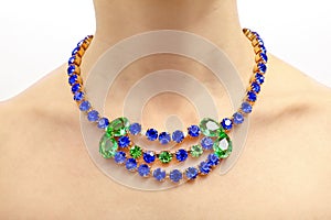 Luxury gemstone necklace on a woman's neck