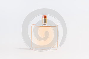 Luxury glass perfume bottle on white background. Copy space for text, blank bottle