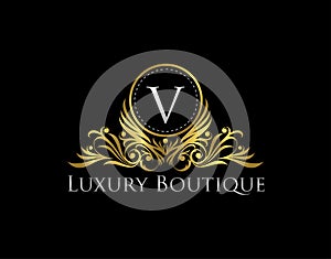 Luxury Gold Boutique Logo Vector Design. Premium Golden Bagde V Letter Icon photo