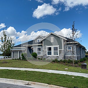 A luxury gray house in the Laureate Park neighborhood