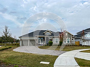 A luxury gray house in the Laureate Park neighborhood in Orlando, Florida. photo