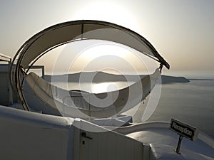 Luxury hammock with sea view behind from Fira in Santorini, Greece