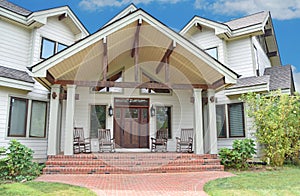 Luxury Home Rocking Chairs and Brick Walk