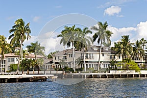 Luxury homes by canal waterway photo