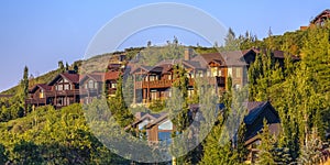 Beautiful homes in sunset light Park City pano photo