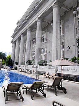 Luxury hotel pool, loungers