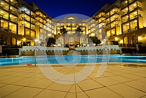 Luxury hotel pool at night photo