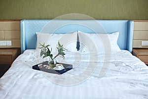 Luxury Hotel Room with Bed Breakfast. Tray with Coffee and Fruits. Good Beach Resort Service. Cozy Intrerior Background