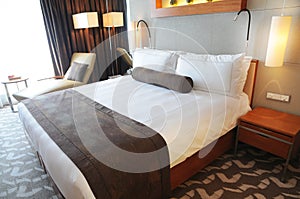 Luxury hotel room with king size bed