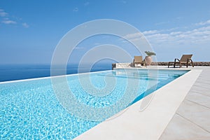 Luxury house with infinity pool over the ocean