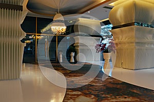 Luxury interiors of chandeliers light at the hotel lobby