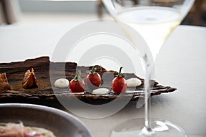 Luxury Italian restaurant, stylish table arrangement, antipasto
