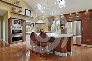 Luxury kitchen with redwood cabinetry