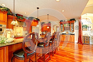 Luxury kitchen room with rich carved wood stools