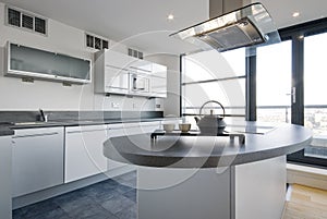 Luxury kitchen with separate work areas photo