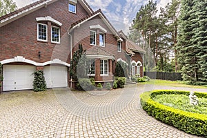 Luxury and large house in english style with garden and driveway